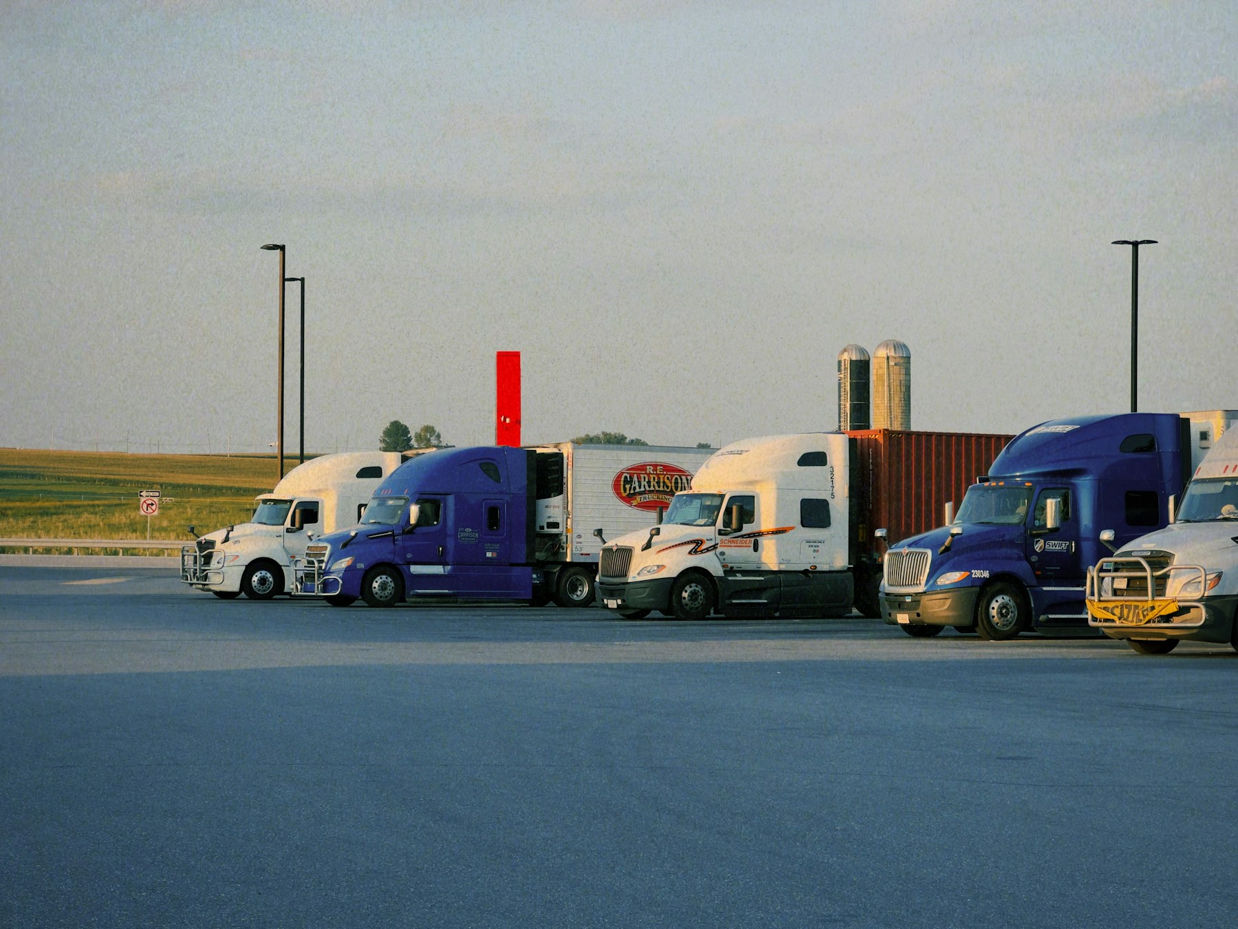 Trucks parked safely in an overnight parking lot